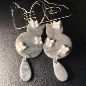 Silver cats with butterflies